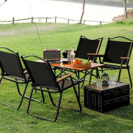 Silla Kermit plegable de diseño moderno y ligero con estructura de madera, ideal para acampar al aire libre. 